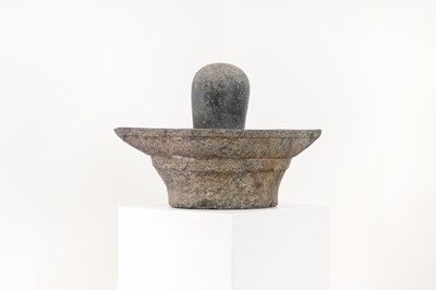 Lot 170A - A carved granite lingam and yoni