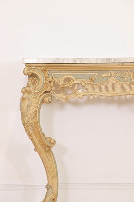 Lot 432 - A carved and painted pine console table