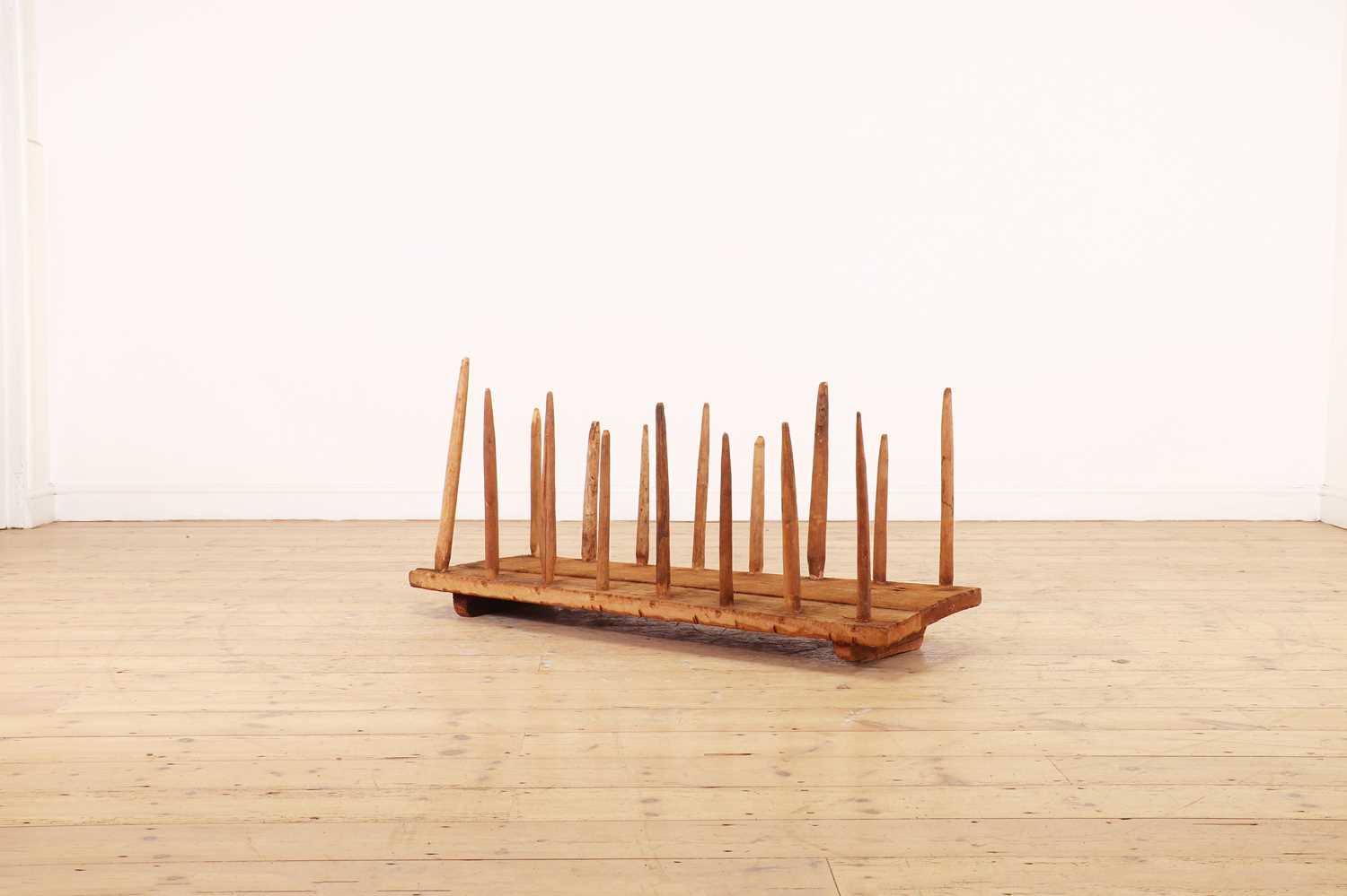 Lot 479 - A rustic oak boot rack,