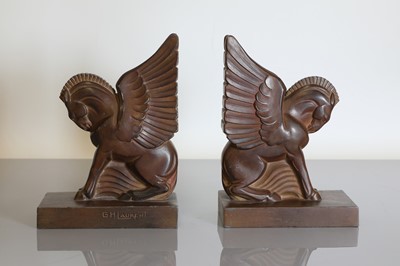 Lot 208 - A pair of French Art Deco bronzed spelter bookends