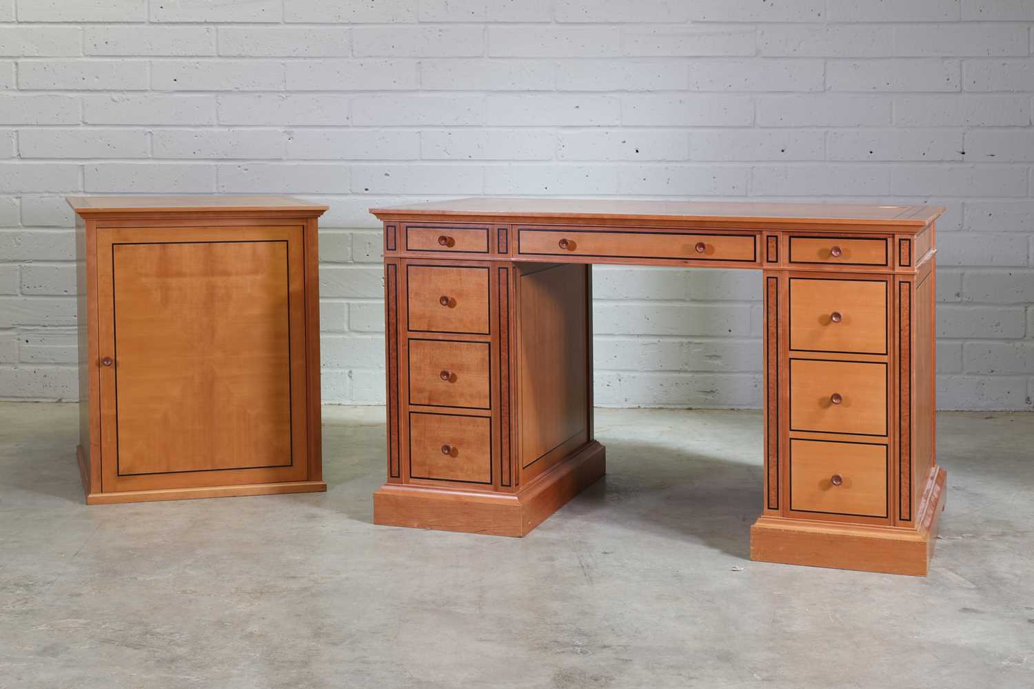 Lot 589 - A cherrywood and burlwood pedestal desk