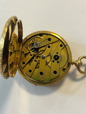 Lot 499 - A Swiss key wound enamel and diamond open faced fob watch