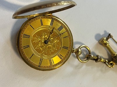 Lot 499 - A Swiss key wound enamel and diamond open faced fob watch
