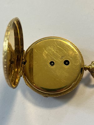 Lot 499 - A Swiss key wound enamel and diamond open faced fob watch
