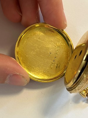 Lot 499 - A Swiss key wound enamel and diamond open faced fob watch