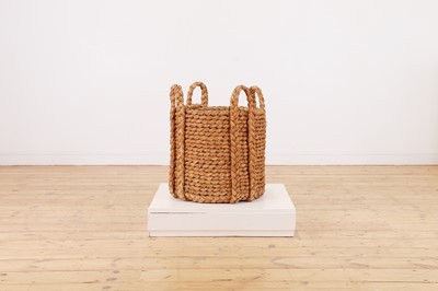 Lot 385 - A woven rush log basket