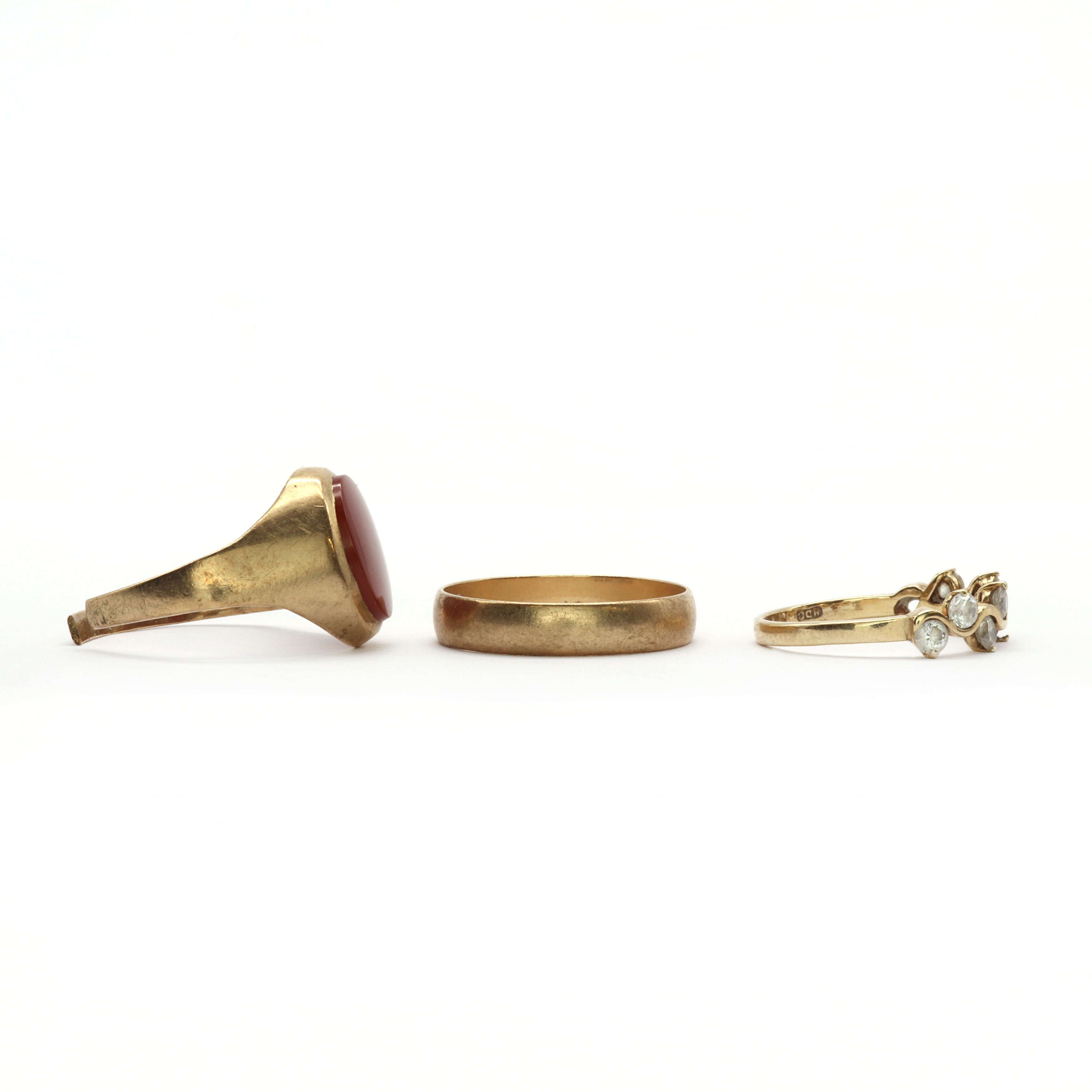 Lot 192 - Three 9ct gold rings,