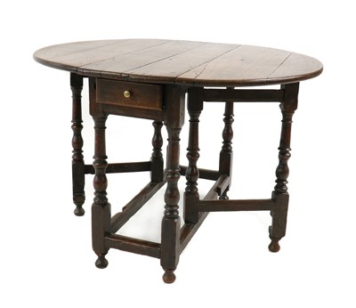 Lot 349 - An oak gateleg table