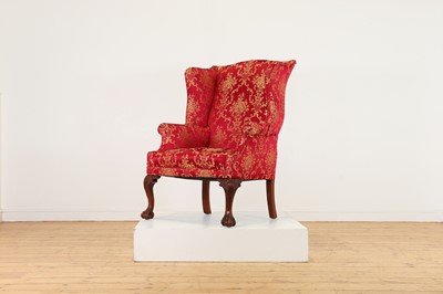Lot 170 - A George I-style wingback armchair