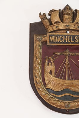 Lot 623 - A painted bronze ship's badge for HMS Winchelsea