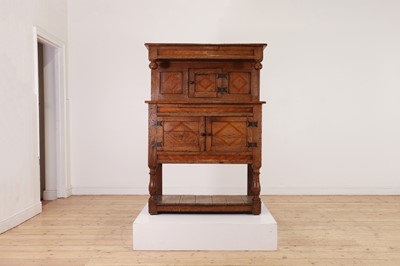 Lot 542 - A small oak cupboard in the 17th century style