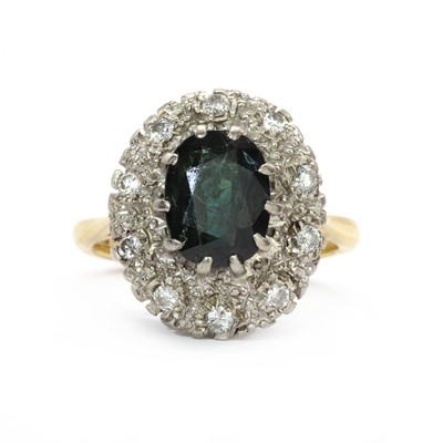 Lot 126 - An 18ct gold sapphire and diamond cluster ring