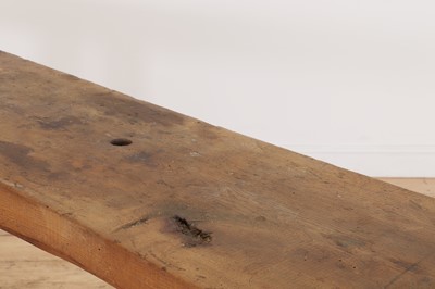 Lot 369 - A rustic elm workbench console table