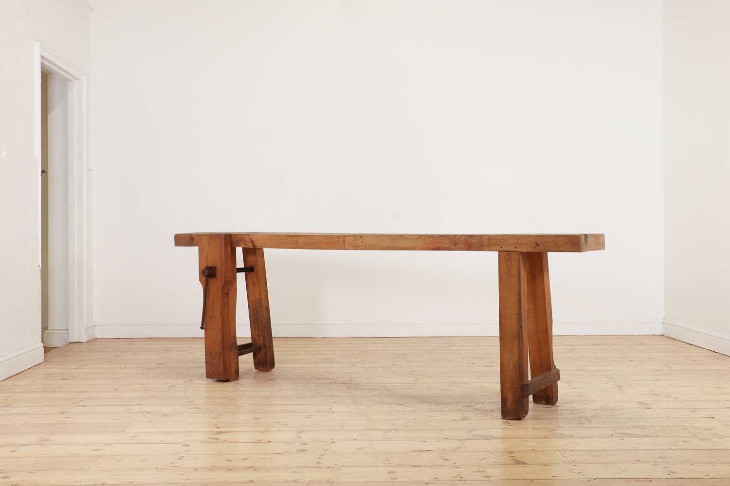 Lot 369 - A rustic elm workbench console table