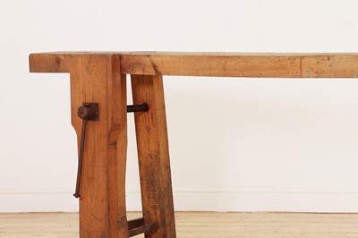 Lot 369 - A rustic elm workbench console table