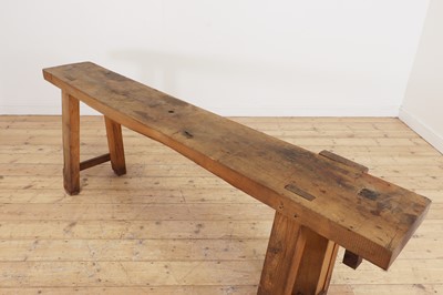 Lot 369 - A rustic elm workbench console table