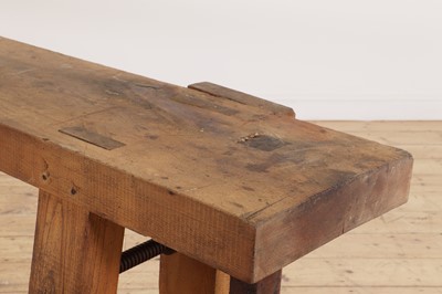 Lot 369 - A rustic elm workbench console table
