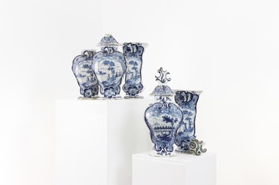 Lot 600 - A delft pottery blue and white garniture