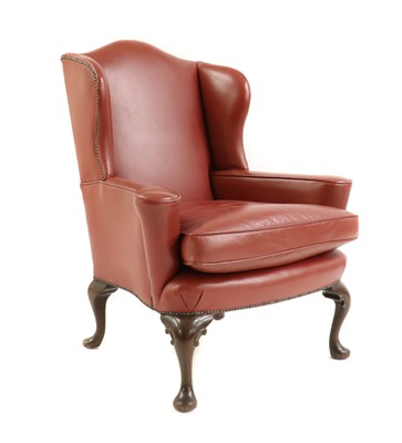 Lot 292 - A George I-style mahogany and leather wingback armchair