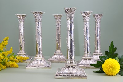 Lot 116 - A composed set of six Edwardian silver candlesticks