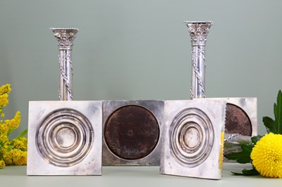 Lot 116 - A composed set of six Edwardian silver candlesticks