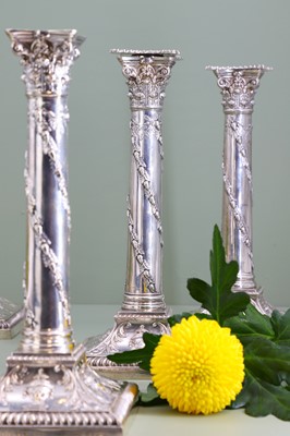 Lot 116 - A composed set of six Edwardian silver candlesticks