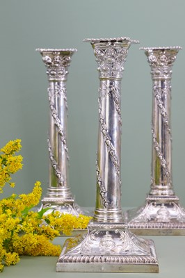 Lot 116 - A composed set of six Edwardian silver candlesticks