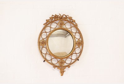 Lot 470 - A gilt gesso convex mirror