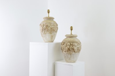 Lot 388 - A pair of composition table lamps after Clodion