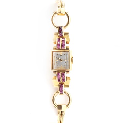 Lot 270 - A French gold ruby mechanical cocktail watch