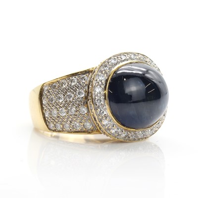 Lot 293 - A gold sapphire cabochon and diamond ring