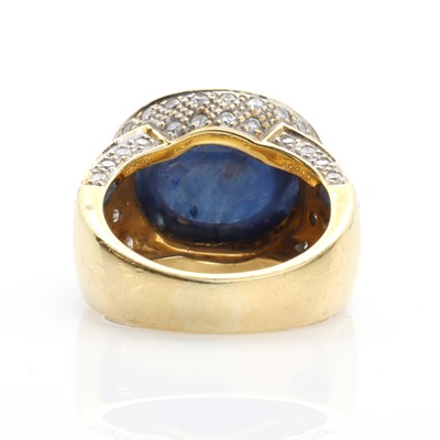 Lot 293 - A gold sapphire cabochon and diamond ring