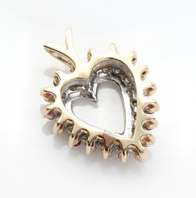 Lot 317 - A ruby and diamond heart shaped pendant