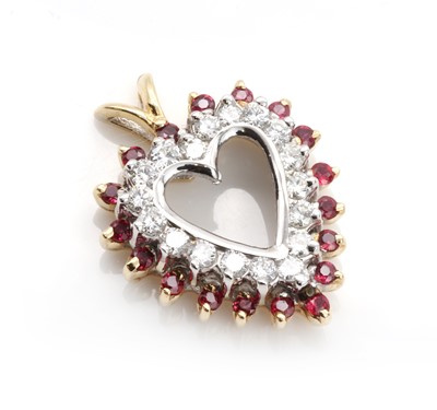 Lot 317 - A ruby and diamond heart shaped pendant