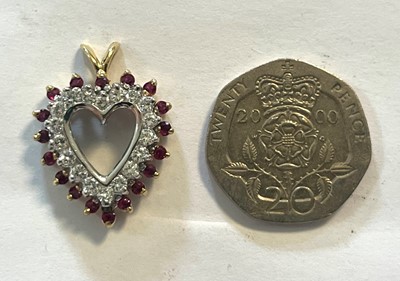 Lot 317 - A ruby and diamond heart shaped pendant