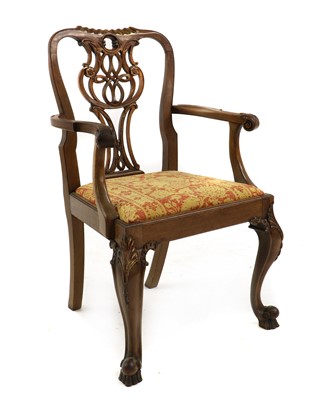 Lot 580 - A George III-style mahogany and parcel-gilt open armchair