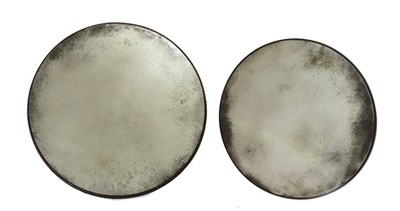 Lot 458 - A pair of graduated circular mirrors