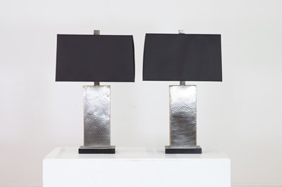 Lot 544 - A pair of modernist hammered-metal table lamps