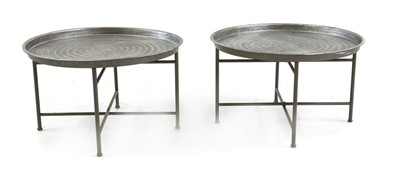Lot 316 - A pair of hammered metal tray-top side tables