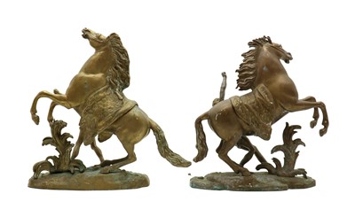 Lot 269 - A pair of brass 'Marley' horses