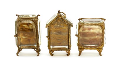Lot 145 - A group of three Palais Royale style glass watchcases