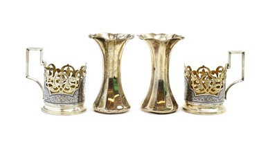 Lot 51 - A pair of Russian style silver cup holders