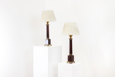 Lot 616 - A pair of red Lucite and brass table lamps