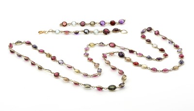 Lot 81 - A single row assorted gemstone spectacle set necklace
