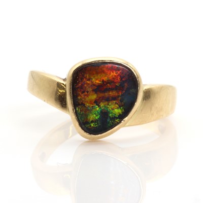 Lot 342 - A single stone freeform boulder opal ring