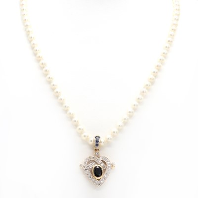 Lot 292 - An 18ct sapphire and cultured pearl detachable heart shaped pendant