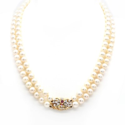 Lot 235 - A two row uniform cultured pearl necklace