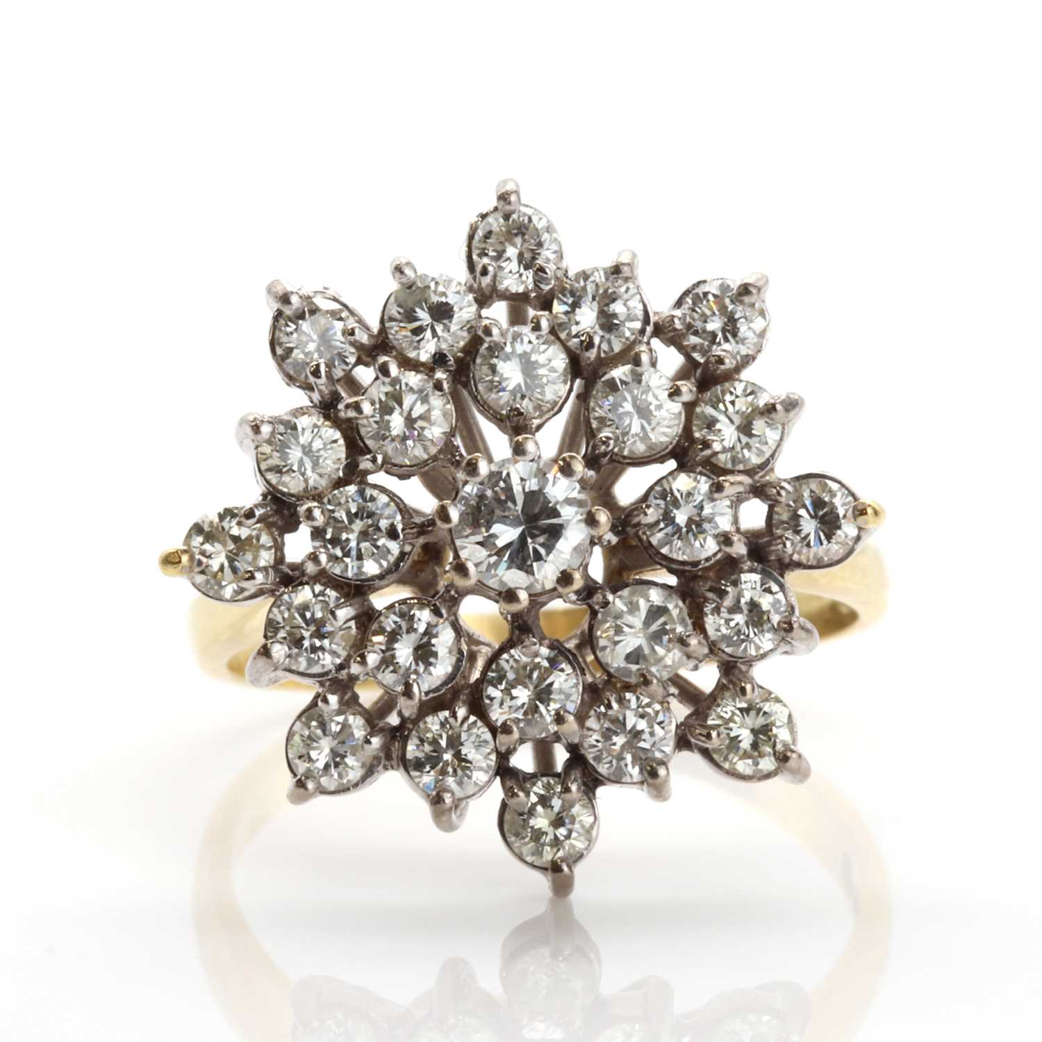 Lot 202 - An 18ct gold diamond set snowflake style