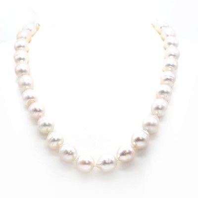 Lot 228 - A single row graduated semi baroque South Sea pearl necklace