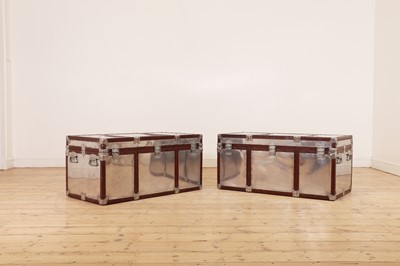 Lot 543 - A pair of polished metal aviator trunks